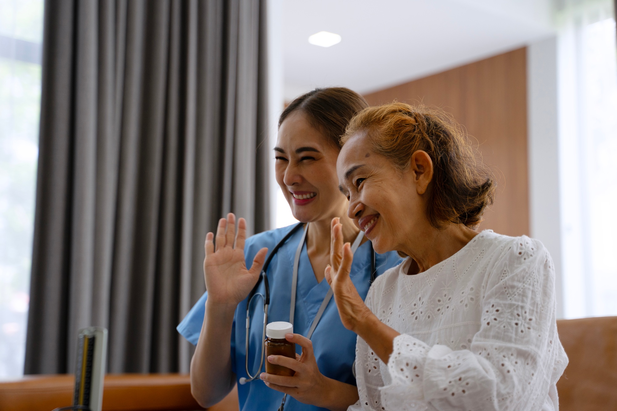 Nurse is take care senior woman at home.